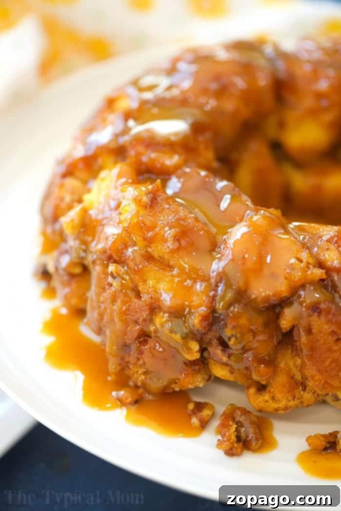 This is the most amazing caramel pumpkin monkey bread you will ever make and it is really easy too!! The best Fall breakfast or dessert I've ever made! #pumpkin #monkeybread #dessert #breakfast #bread #caramel easy pumpkin monkey bread
