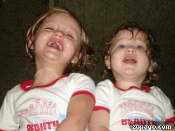Making Family Milestones Memorable 4 Two sisters joyfully bonding and laughing together