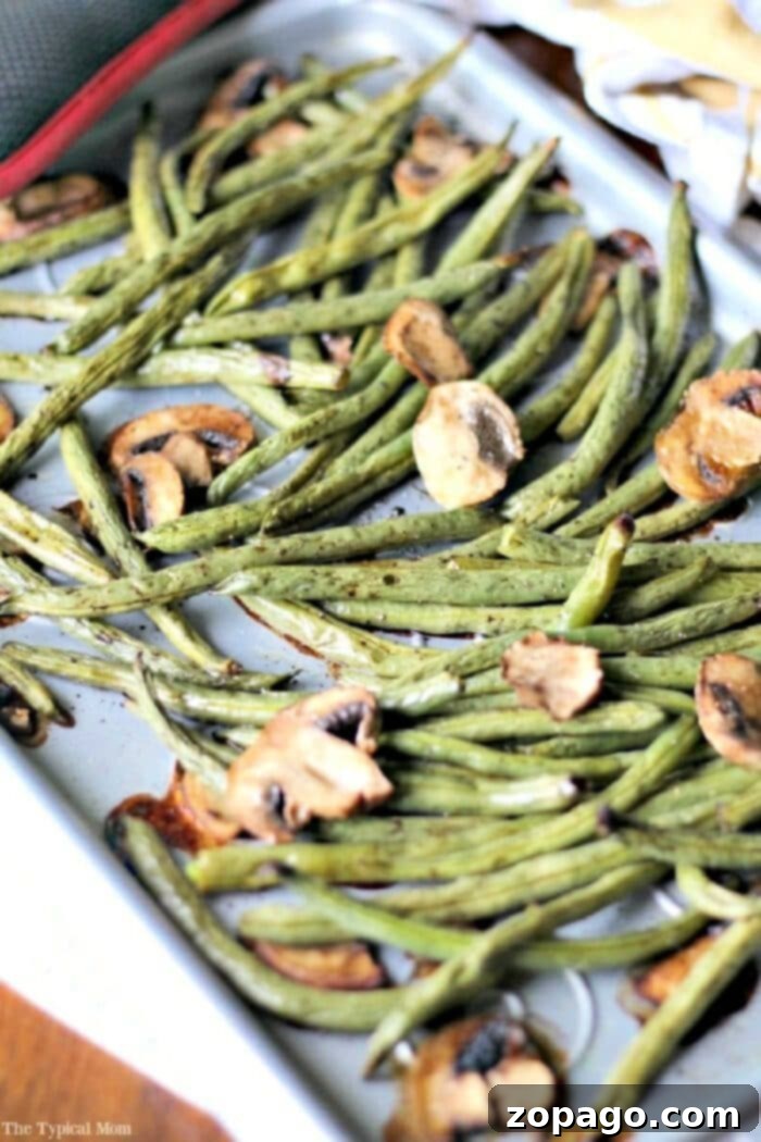 Crispy Sheet Pan Green Beans 2 Best green bean recipe you will ever try that is healthy and so easy to make. Roasted green beans with mushrooms, olive oil, and balsamic vinegar on a sheet pan.