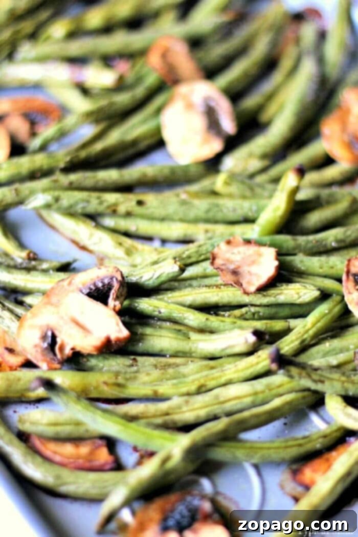 Crispy Sheet Pan Green Beans 4 Sheet pan green beans and mushrooms roasted to perfection, creating a delightful medley of textures and flavors.
