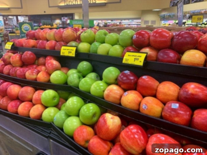 Crisp Sparkling Alcohol-Free Apple Cider 2 A vibrant selection of fresh apples, ready for slicing and garnishing.