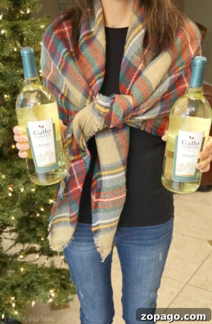Gift wine bottles in a scarf!! Make a fun and useful gift! Step by step instructions of how to wrap 2 bottles in a scarf to create a unique gift. how-to-gift-wine-bottles-in-a-scarf