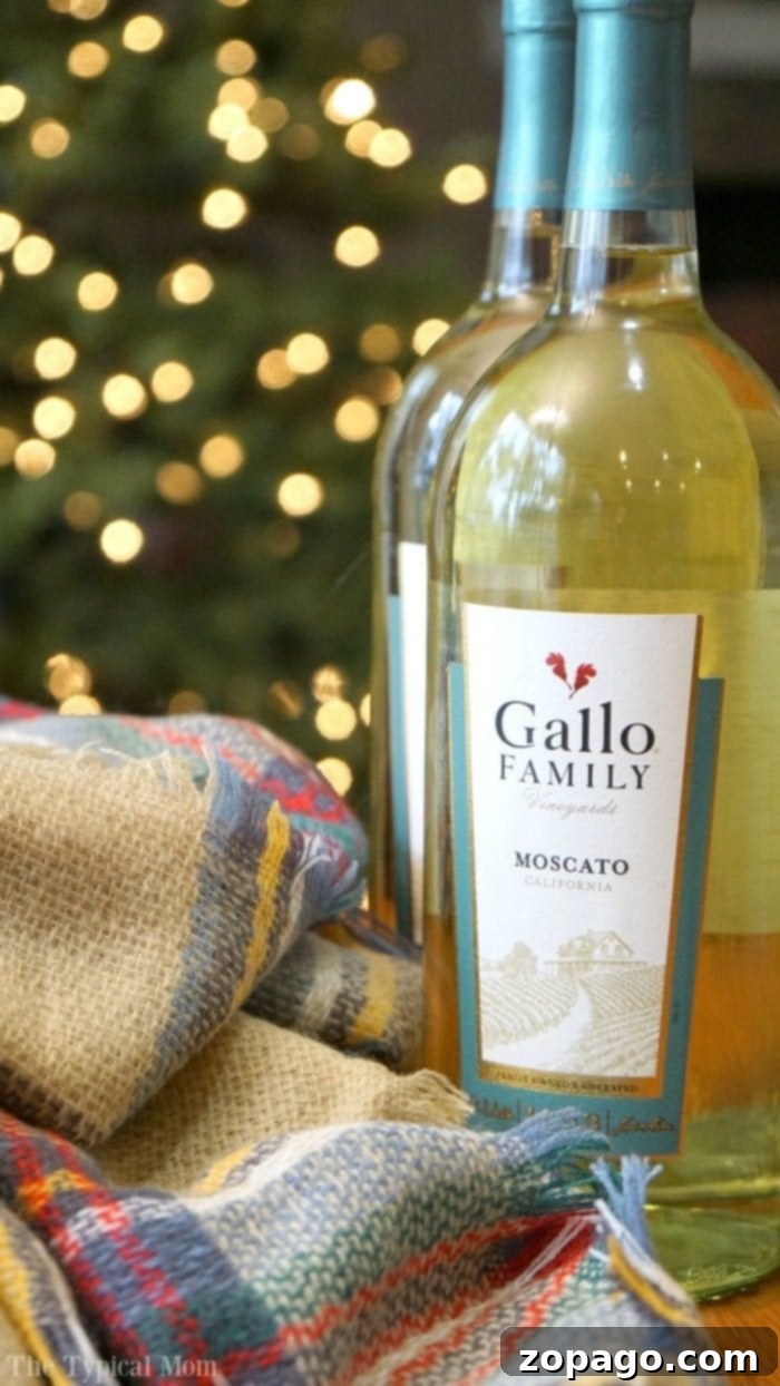 How to gift wine bottles in a scarf to make it a fun and useful gift! Step by step instructions of how to wrap 2 bottles in a scarf to create a unique gift. img 30434 4