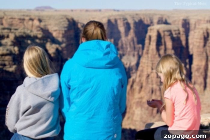Grand Canyon Arizona is a fabulous place to visit with your family! Here are pictures of our experiences there and what spots you won't want to miss. #grandcanyon #arizona #roadtrip #vacation #familyvacation #summer Stunning view of the Grand Canyon's layered rock formations under a clear sky