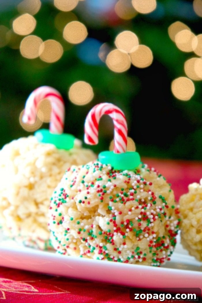 Easy and Fun Rice Krispy Treat Ornaments for Christmas Hand holding a whimsical Rice Krispy Treat Ornament, perfect for holiday gifting or decorating.