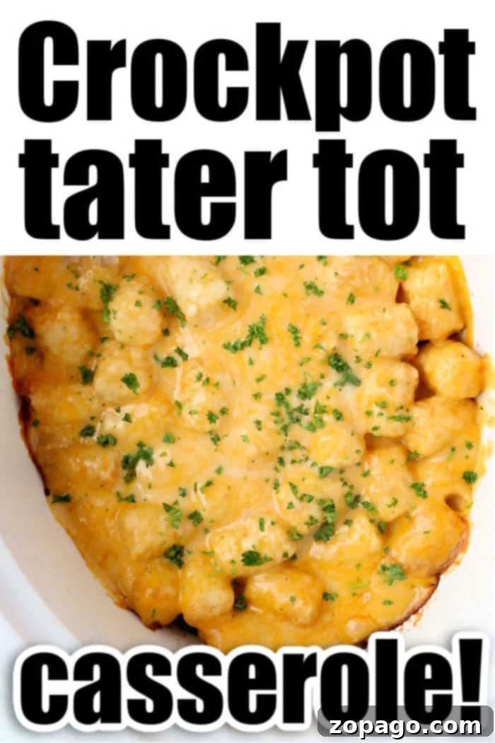 Slow Cooker Creamy Mushroom Tater Tot Casserole 7 A hearty slow cooker tater tot casserole topped with melted cheese and fresh herbs, ready to be scooped and served from the Crock Pot.
