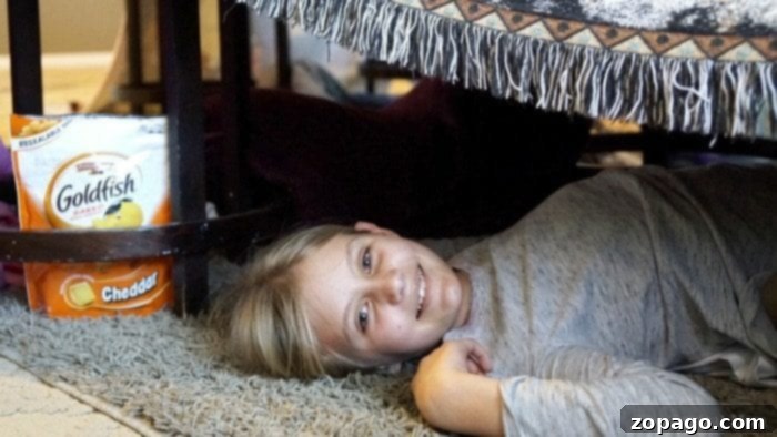 Kick Off with Free Football Bingo 3 Kids playing in a blanket fort, a classic free activity for parties.