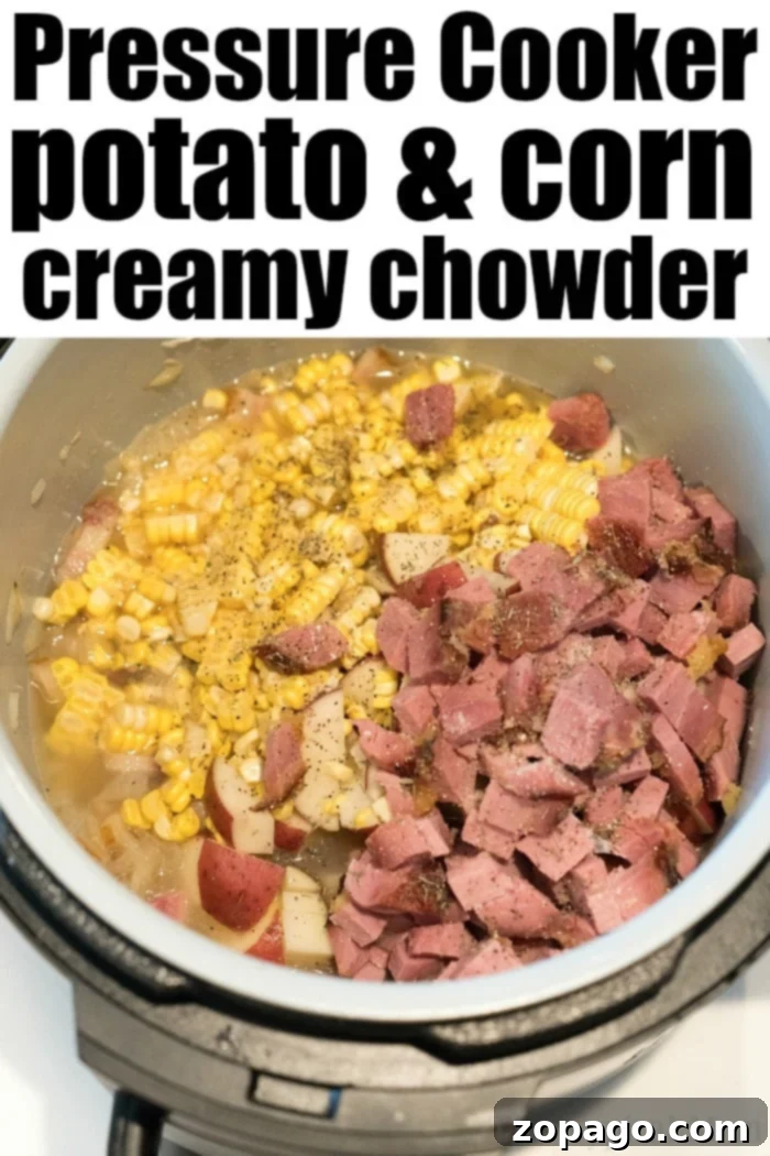 Creamy Instant Pot Potato Corn Chowder 7 A large pressure cooker pot filled with savory potato and corn chowder, simmering to perfection.