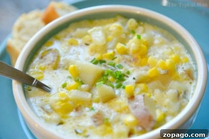 Hearty Instant Pot Potato Corn Chowder for a Cozy Meal A large pot of creamy Instant Pot Potato Corn Chowder, steaming and ready to be served.