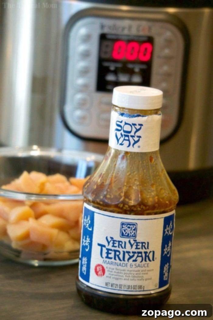 Quick and delicious pressure cooker teriyaki chicken, cooked in 3 minutes for tender results. A healthy and affordable family meal. Pressure Cooker Teriyaki Chicken with Rice and Green Onions