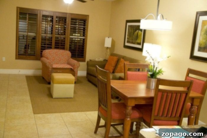 experia resorts Spacious and modern living area inside an Experia Resort suite, showcasing comfortable furniture and a welcoming ambiance.
