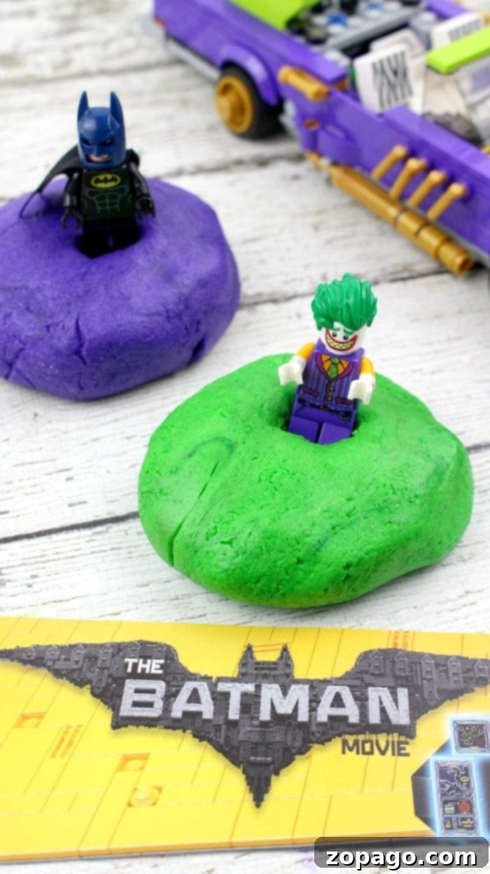 How to throw a Batman birthday party. Lots of crafts, cake ideas, and activities to make a fun and inexpensive birthday party with a Batman theme. batman birthday party setup with decorations and cake