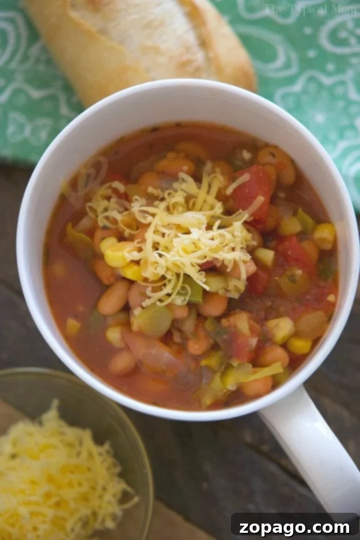 This easy chili bean recipe is a quick and hearty dinner with just enough spice for everyone! Three bean vegetarian chili we love in just 20 minutes flat. easy chili bean recipe