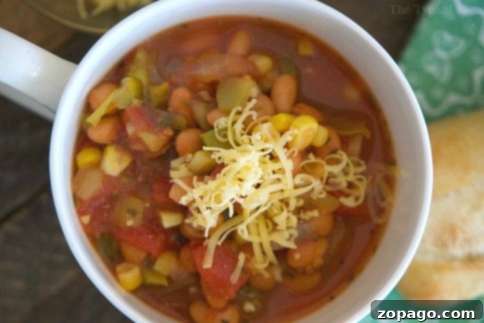 This easy chili bean recipe is a quick and hearty dinner with just enough spice for everyone! Three bean vegetarian chili we love in just 20 minutes flat. easy chili bean recipe