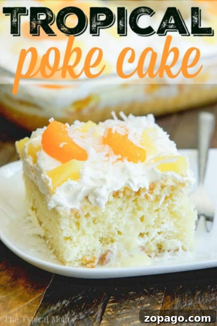 Tropical Poke Cake: Moist, Fruity, and Easy Tropical poke cake featuring pineapple, orange, and coconut flakes, ready to be served.