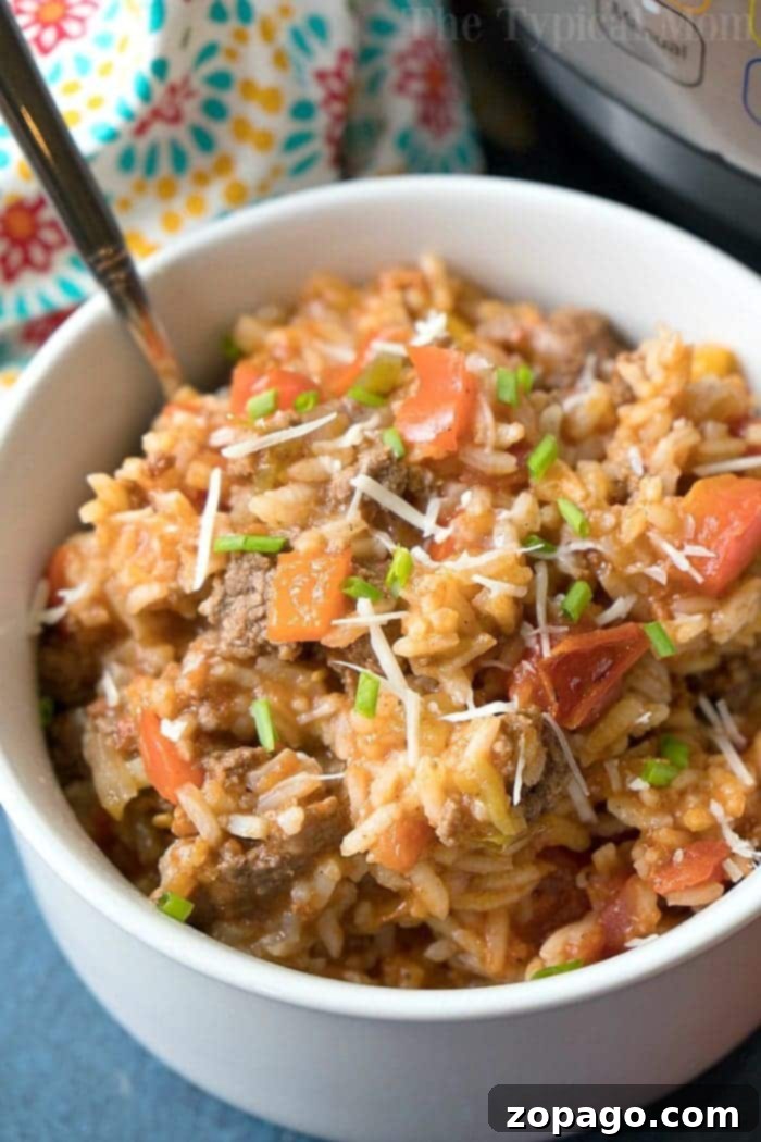 Loaded Cheesy Pepper Bake 4 Stuffed Pepper Casserole with cooked rice, ready to serve