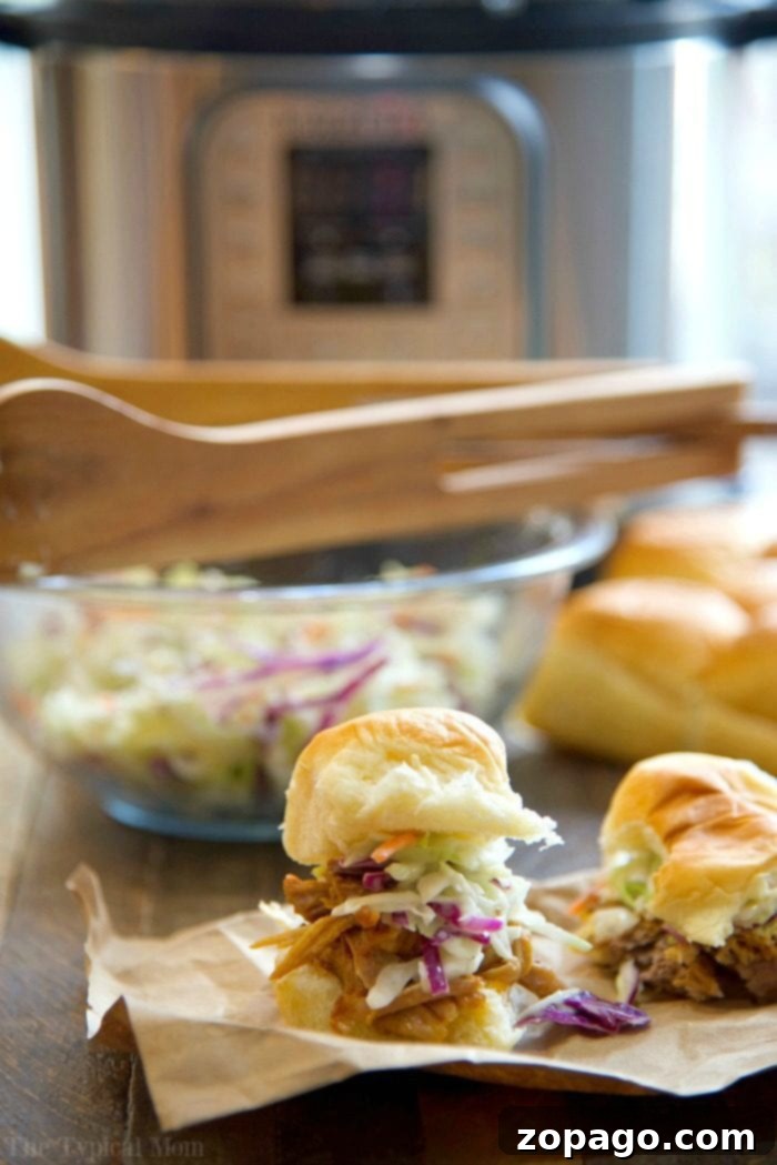 Easy Instant Pot pork shoulder recipe for tender pulled pork. Easy pressure cooker pulled pork, ready to be shredded.