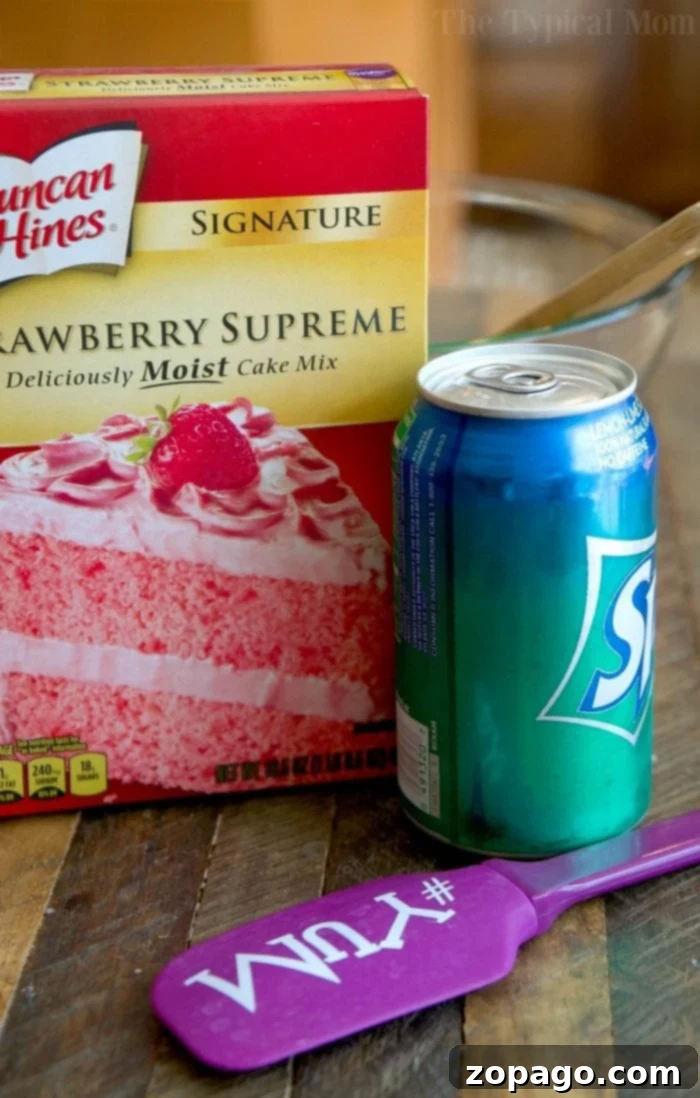 This 2-ingredient strawberry cake with soda pop is an amazing and easy-to-make dessert. It's egg-free, super moist, and lower in calories, making it a delicious choice for any occasion. Some call it soda pop cake or a throw-together dump dessert, but everyone raves about it! #strawberrycake #bundtcake #sodacake #skinny #eggfree #cake #dessert 2 ingredient strawberry cake 2