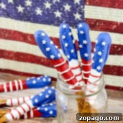Red White and Blue July 4th Pretzels 3 Chocolate Fourth of July patriotic pretzels on a blue background.