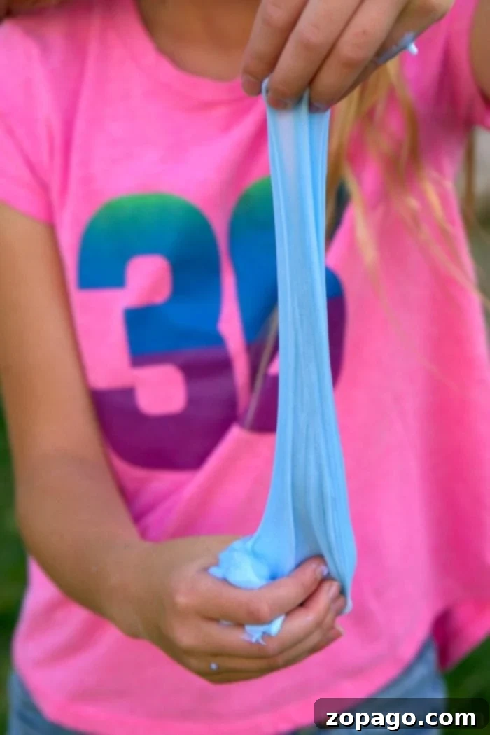 Discover how to make laundry detergent slime at home with only 2 ingredients! This easy goo recipe is made with glue and detergent, offering endless fun and customization with your favorite colors. laundry detergent slime