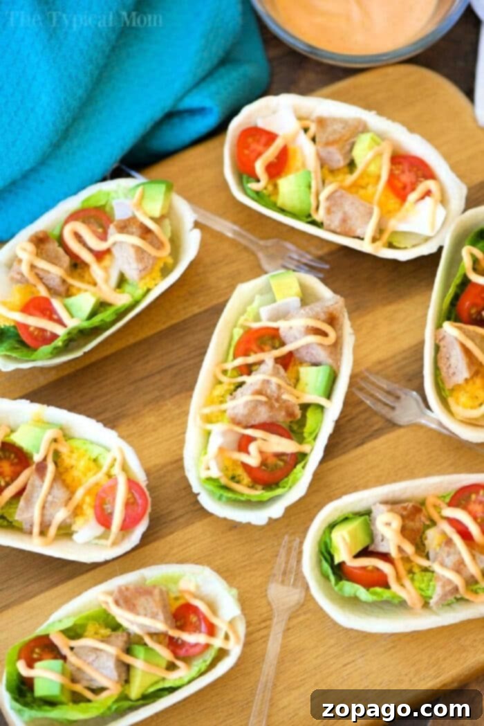 Taco Burger Canoes 2 Delicious Mini Turkey Burger Boats, perfect for appetizers or a light meal.