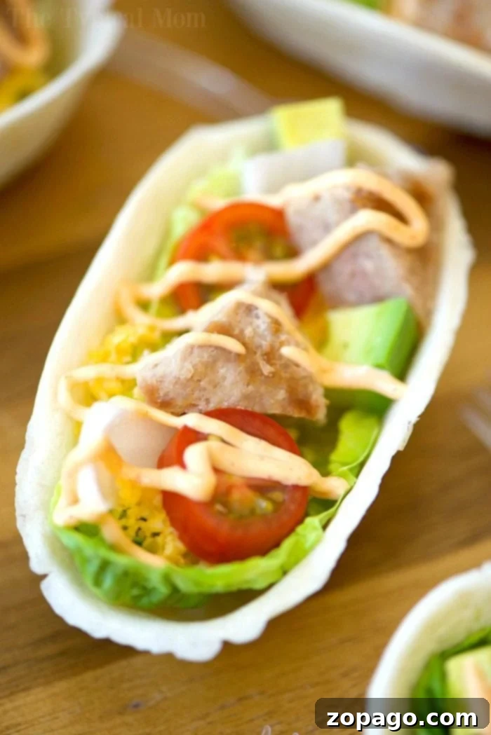 These mini turkey burger boats are the best appetizers! Packed with protein and fresh produce they are the perfect bite size for everyone, and healthy too. #appetizers #burger #groundbeef #boats #hamburger turkey burger boats 2