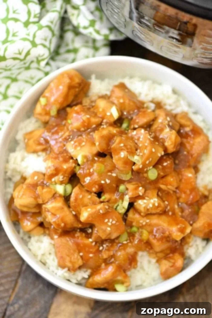 Instant Pot Fiery Honey Chicken 7 A close-up shot of the finished Instant Pot Spicy Honey Chicken, glistening with sauce.