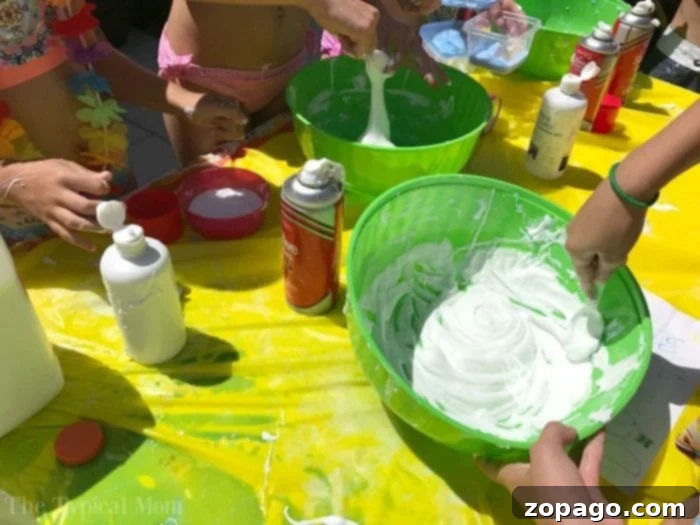Discover how to throw the ultimate slime birthday party, ensuring a day filled with creative fun, laughter, and unforgettable memories for every child! #slime #birthdayparty #party #birthday #boy #girl #games #activities Close-up of vibrant, colorful slime being stretched by a child's hands at a fun birthday party.