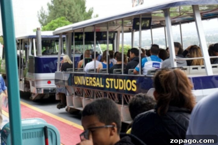 Harry Potter World Universal Studios Unpacked 5 Family enjoying Universal Studios Hollywood with Harry Potter World in the background