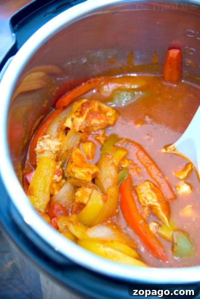 Instant Pot chicken cacciatore recipe: quick, moist, flavorful with just 3 ingredients. A low-carb, kid-friendly meal that's cheap and healthy! Instant Pot chicken cacciatore recipe with vibrant bell peppers and rich sauce.