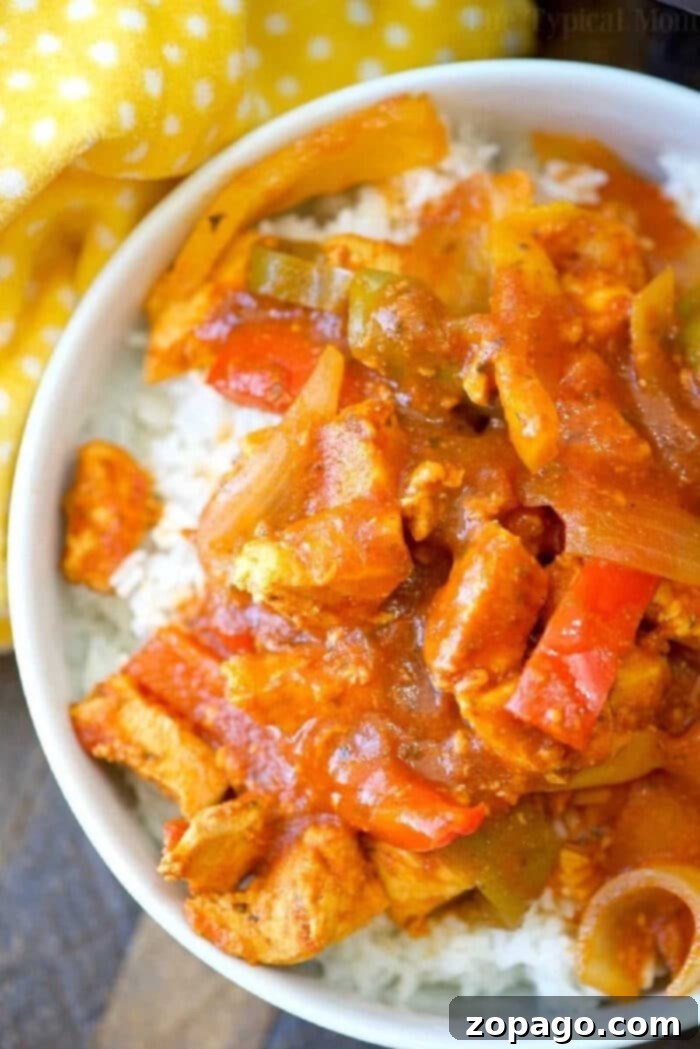 Instant Pot chicken cacciatore recipe: so easy, 3 minutes to cook, moist and flavorful with just 3 ingredients. A low-carb, kid-friendly meal that's cheap and healthy! Delicious Instant Pot chicken cacciatore served in a bowl, showcasing the tender chicken, peppers, and rich sauce.