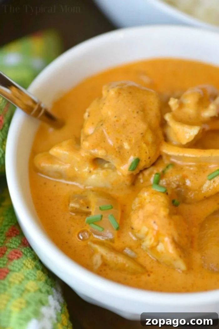 Delicious & Easy Instant Pot Butter Chicken for Busy Weeknights A close-up of creamy, easy Instant Pot butter chicken in a bowl, garnished with fresh herbs, showcasing its rich texture and appetizing appeal.