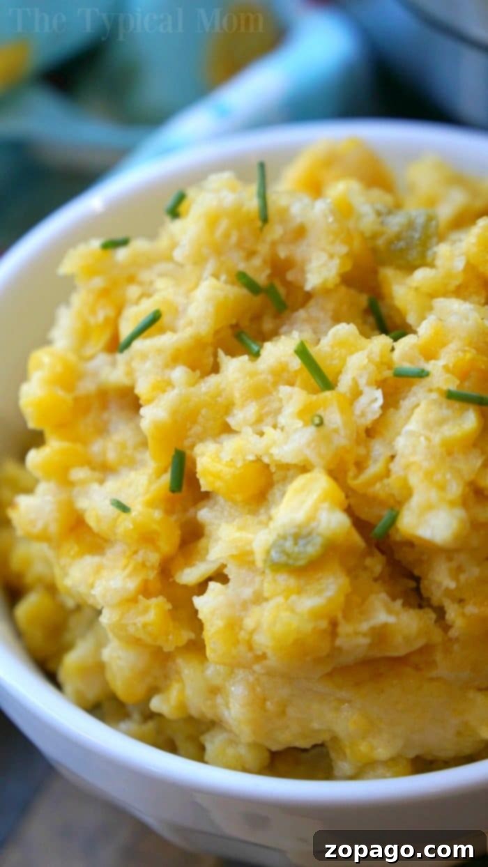 Creamy Instant Pot Corn Casserole Ready to Serve A generous serving of Instant Pot corn casserole, perfectly scooped into a rustic bowl, showcasing its creamy texture and readiness to be savored.
