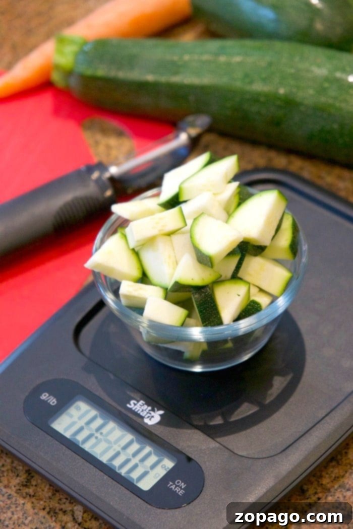 EatSmart Digital Kitchen Scale for Healthy Meal Prep and Portion Control An EatSmart Precision Digital Kitchen Scale displaying a measurement, with a vibrant plate of fresh, healthy ingredients in the background, promoting mindful eating.