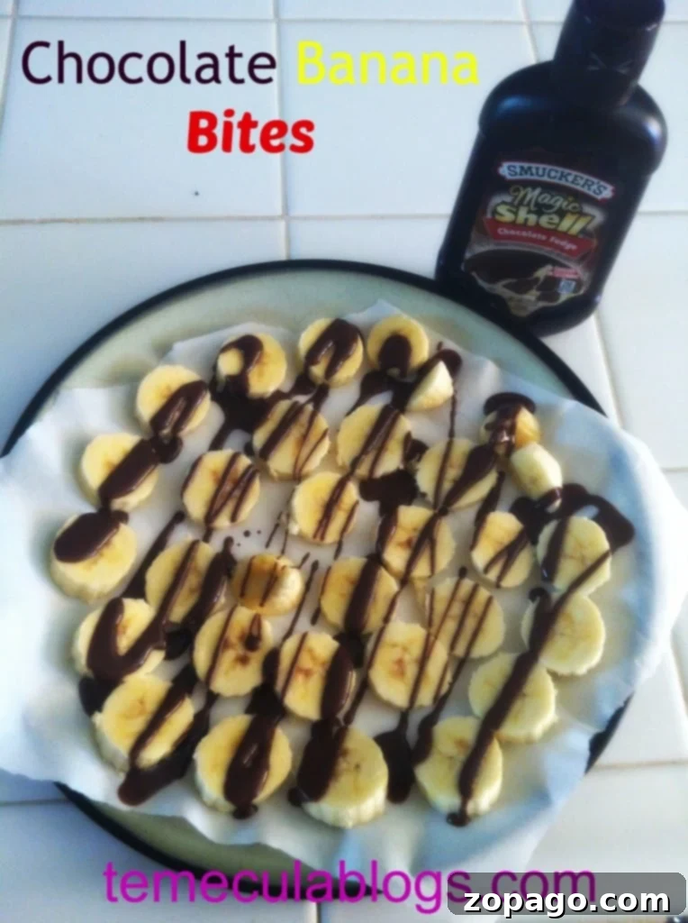 Effortless Summer Snacks 4 Close-up of decadent chocolate-covered banana bites on parchment paper, a perfect frozen treat for sweet cravings.