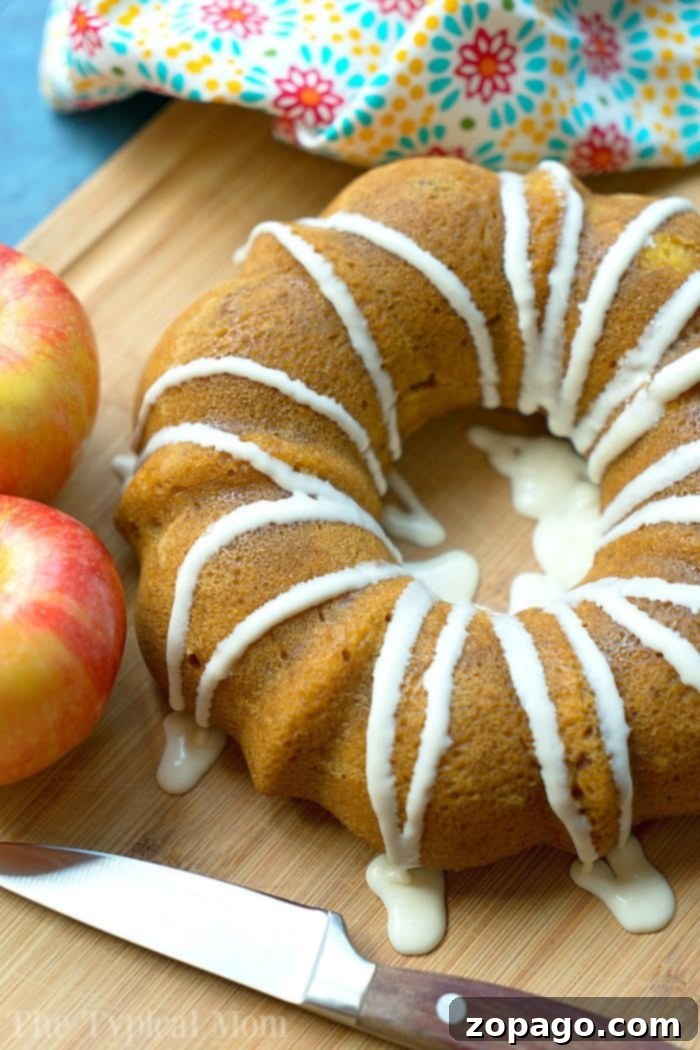 Moist Instant Pot pumpkin apple cake, perfect for Fall dessert or breakfast. Instant Pot pumpkin apple cake with a beautiful golden crust, ready for Fall