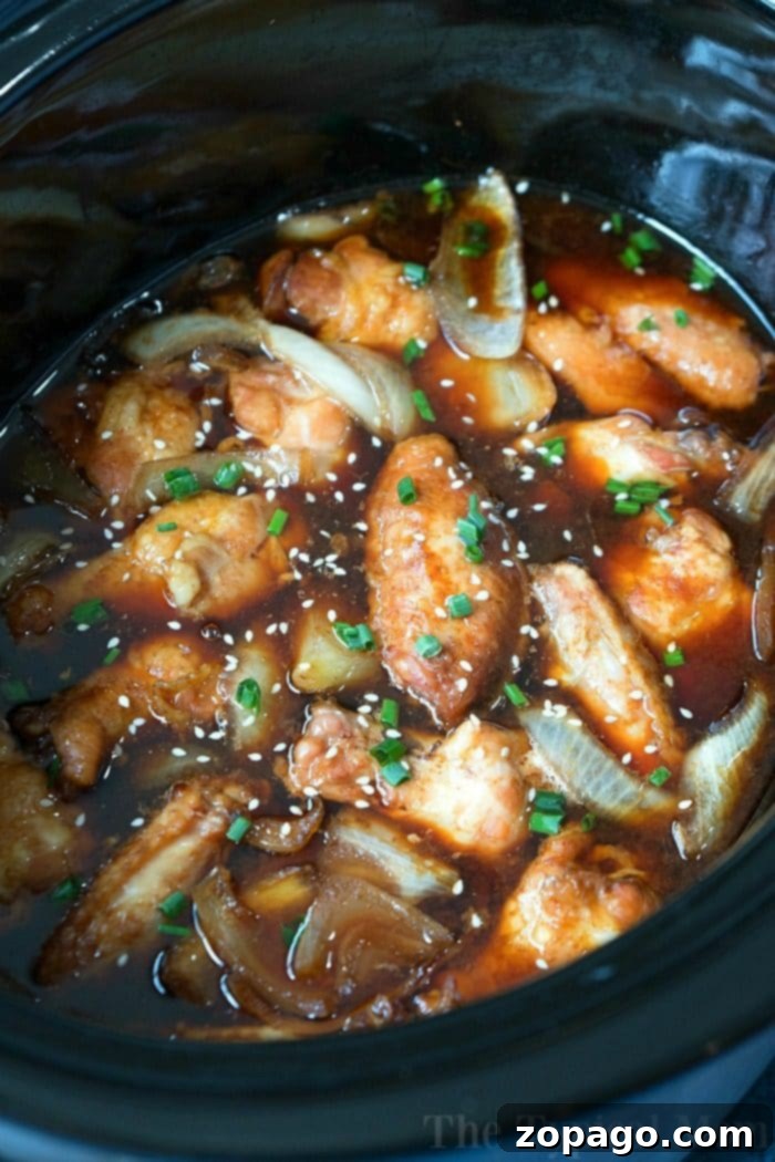 Perfectly cooked Crockpot Teriyaki Chicken Wings Slow cooker teriyaki chicken wings with a sweet and spicy glaze.