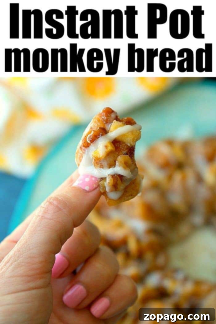 Instant Pot Gooey Cinnamon Roll Monkey Bread 5 Close-up of fluffy, sticky Instant Pot monkey bread on a serving platter, inviting you to pull a piece.