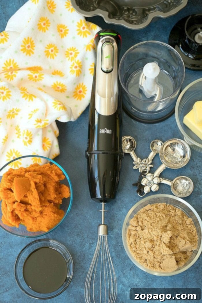 Spiced Gingerbread Pumpkin Bundt 5 Braun MultiQuick 9 immersion blender with chopper attachment, ideal for preparing nuts for baking.