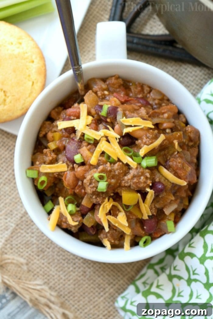 This easy bloody mary chili recipe is thick and packed with flavor! If you love this classic drink or just love chili you've got to try this hearty meal. Close-up of easy Bloody Mary chili recipe, showcasing rich ingredients and thick consistency.