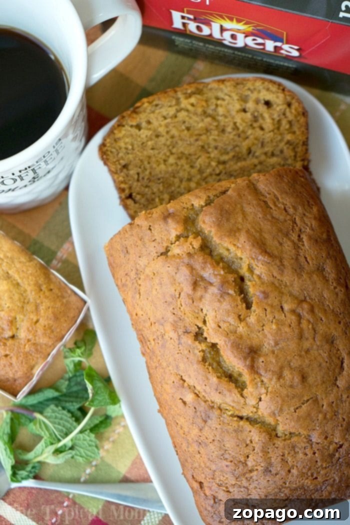 The most delicious pumpkin banana bread recipe is here! Perfect breakfast, brunch or dessert paired with a cup of coffee this holiday season or year round. A slice of warm pumpkin banana bread with a dollop of butter on top