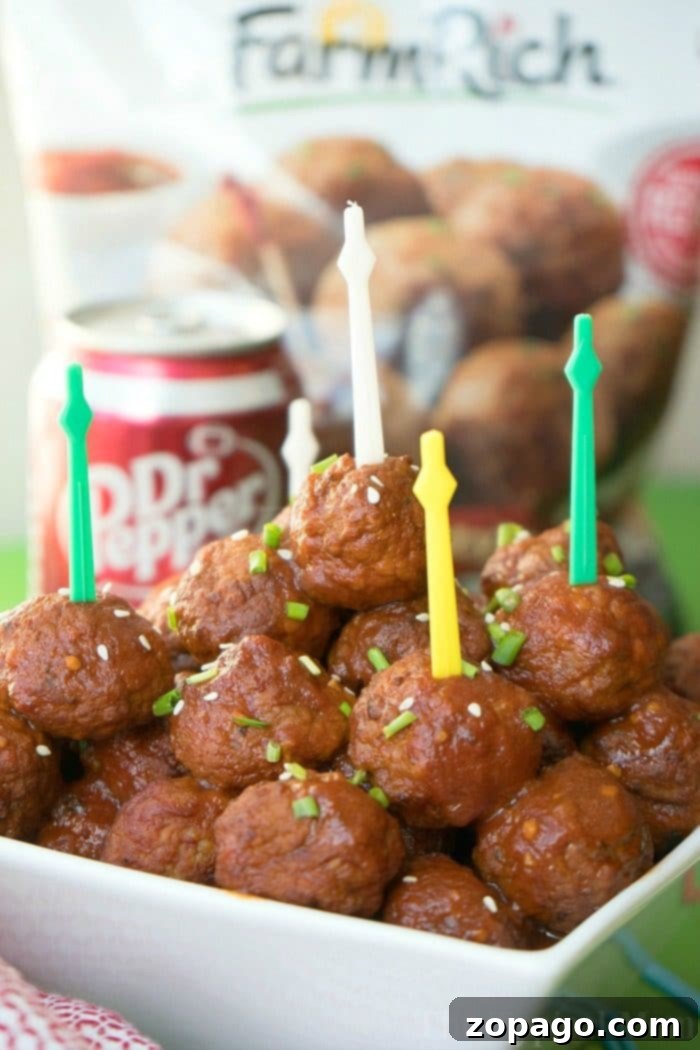 Instant Pot Dr Pepper Barbecue Meatballs: A Super Bowl Favorite Delicious Instant Pot Dr Pepper barbecue meatballs, garnished with sesame seeds and chives, perfect for a Super Bowl appetizer.