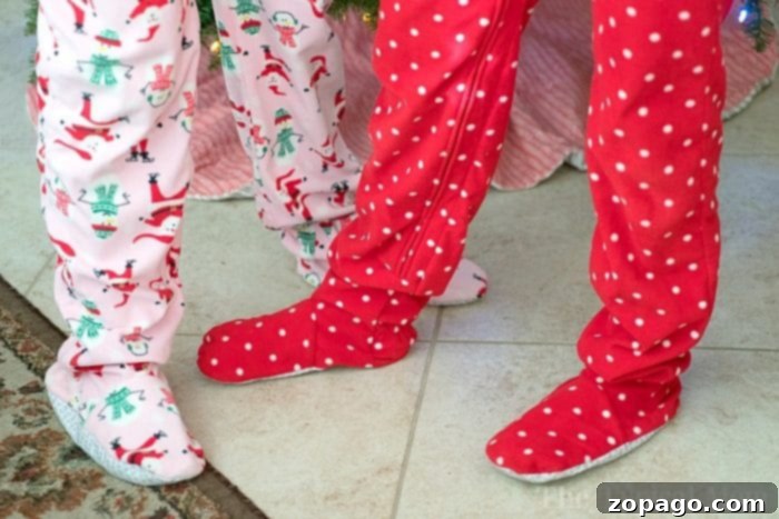 The Magical Christmas Eve Box 5 Children happily wearing their new pajamas from the Night Before Christmas Box, ready for festive activities.
