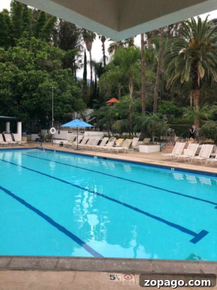 What a relaxing day at Glen Ivy Spa Corona looks like! From The Grotto, to Club Mud and many pools to experience it's a great place to visit with friends. Experience the refreshing outdoor swimming pool with lanes, surrounded by lounge chairs and swaying palm trees, seamlessly echoing the tranquility of Glen Ivy Spa in Corona.