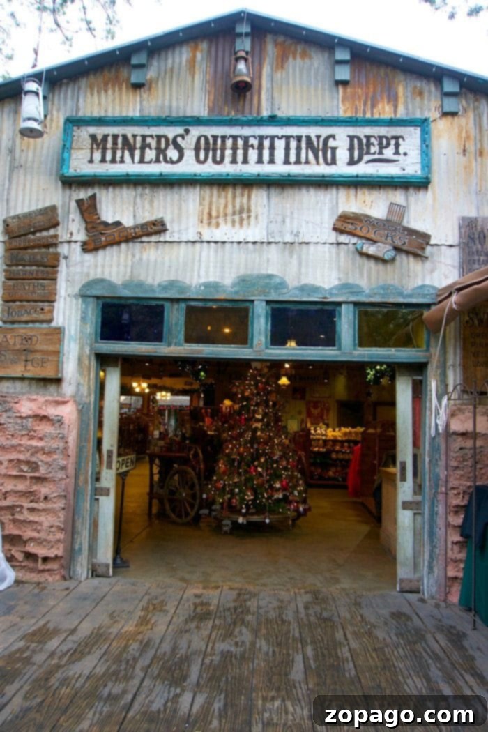 Knott's Merry Farm transforms with real snow, festive decorations, and unique holiday shows for Christmas! Snowfall in Ghost Town at Knott's Merry Farm, a unique Christmas experience in Southern California.