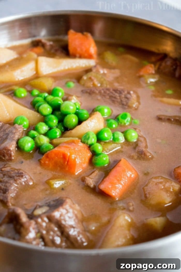 Easy slow cooker beef stew recipe you can make in your crockpot or stovetop too. Tender beef loaded with vegetables and a flavorful sauce too. #crockpot #beefstew Hearty Slow Cooker Beef Stew with Root Vegetables