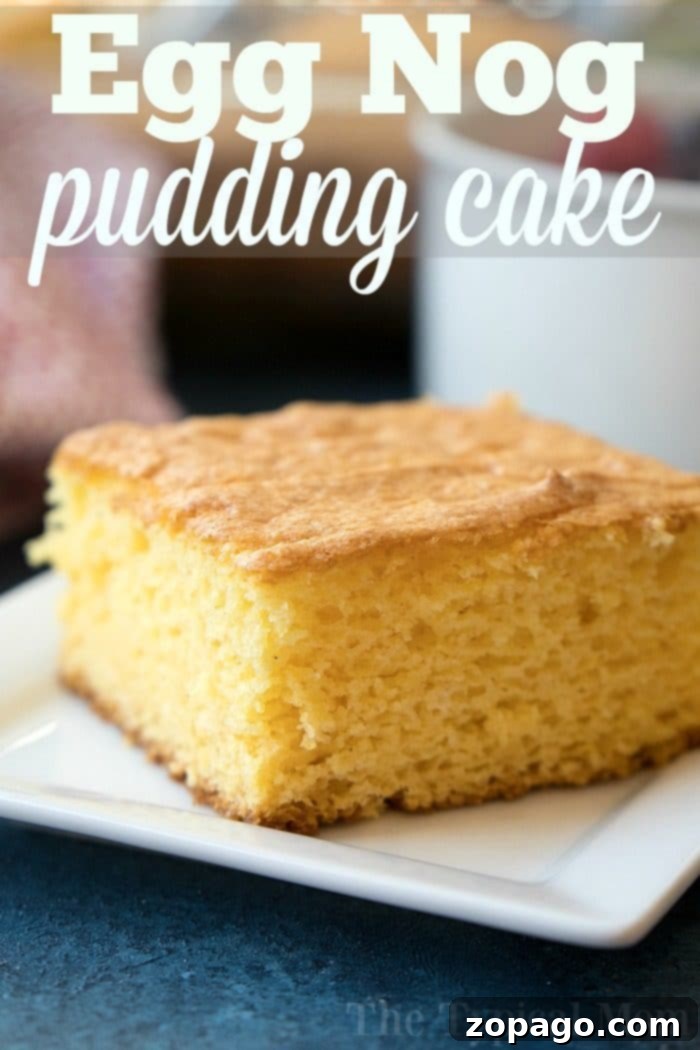 Holiday Eggnog Pudding Cake 5 A beautifully baked egg nog pudding cake, glistening and golden, ready to be sliced and served, evoking warm holiday memories.