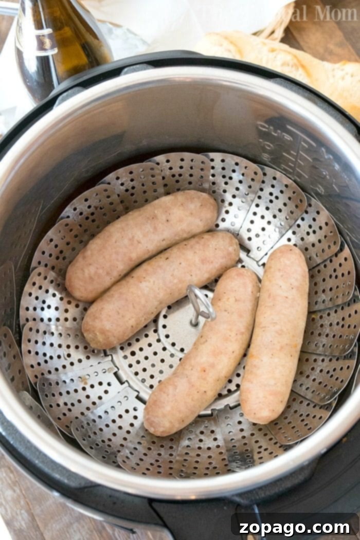 Easy Instant Pot Beer Brats: Quick & Delicious Dinner Idea A plate of cooked Instant Pot beer brats, ready to be served with traditional toppings.