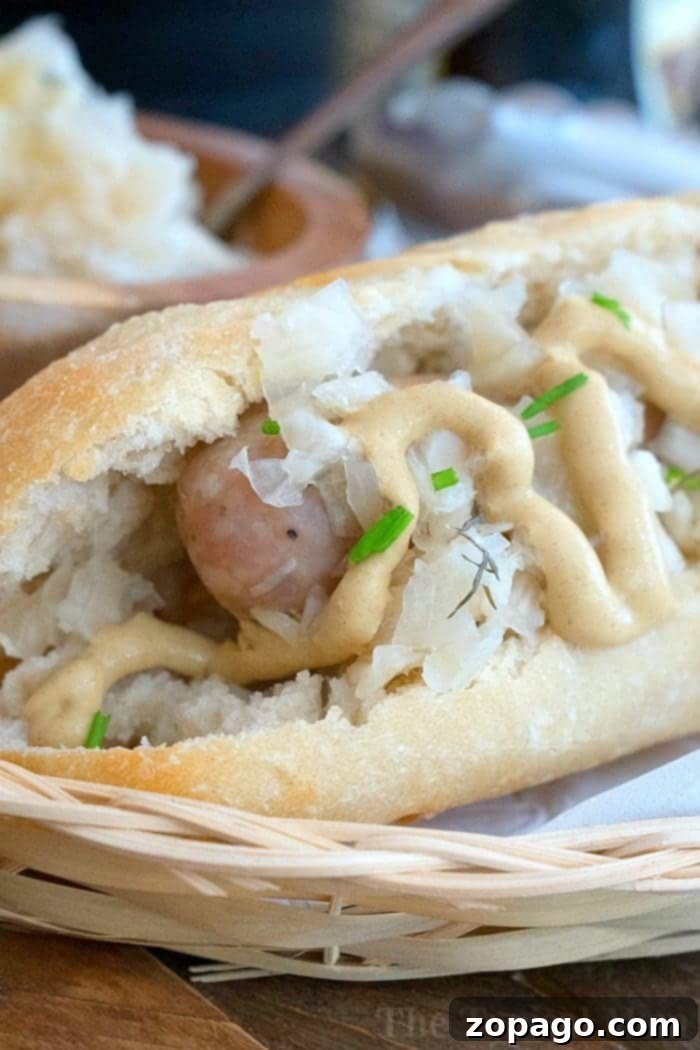 Instant Pot Brats with Beer: A Quick & Flavorful Sausage Dinner Close-up of Instant Pot brats with beer, served in buns with toppings.