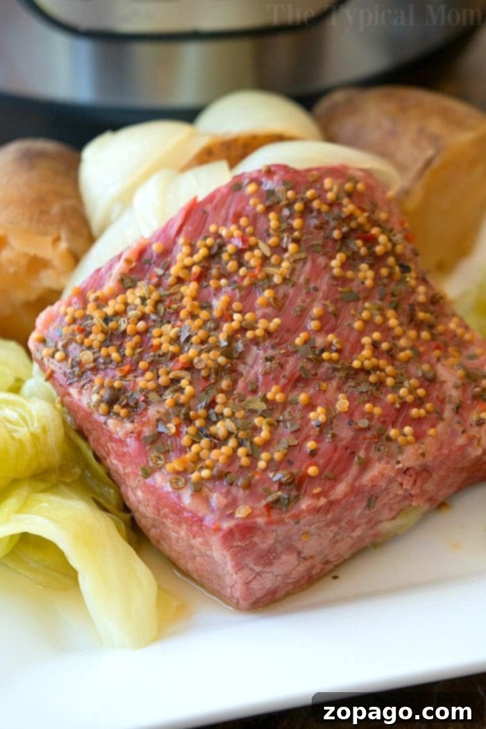 Easy Instant Pot corned beef and cabbage is perfect for St. Patrick's Day or any other day of the year! Moist and flavorful corned beef brisket cooked in your pressure cooker is simple to do with a potato trick I use quite often. easy instant pot corned beef and cabbage 2